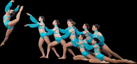 Competition troupe in aqua costumes in a cascading line